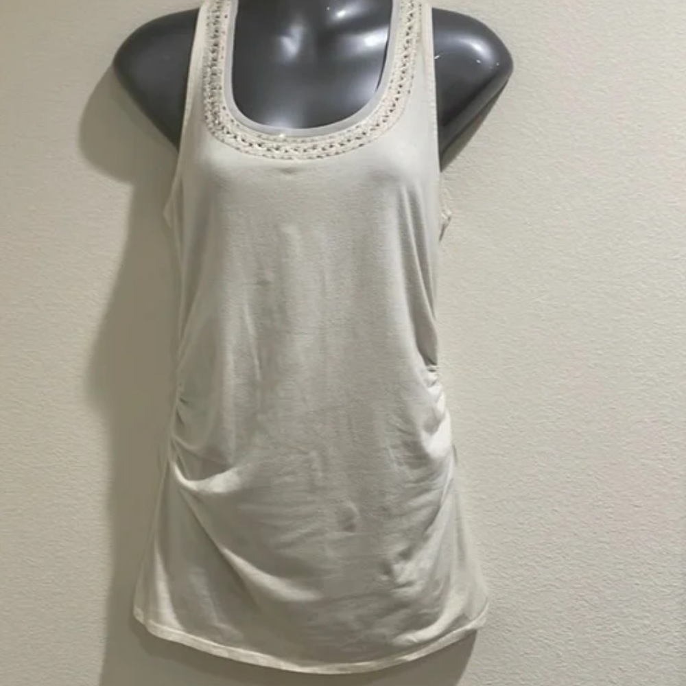 White House Black market beaded tank top size medium.